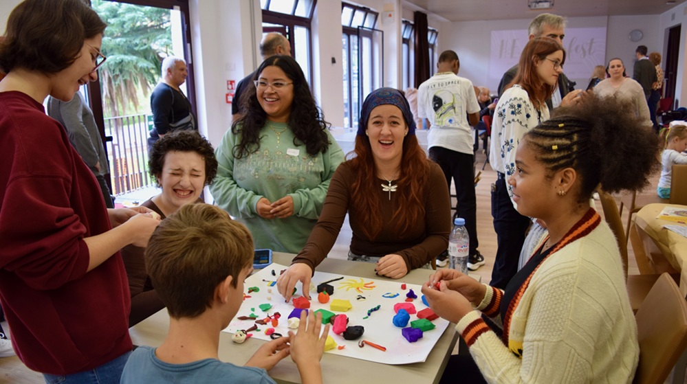 Nursing students play with children of the KIM Association